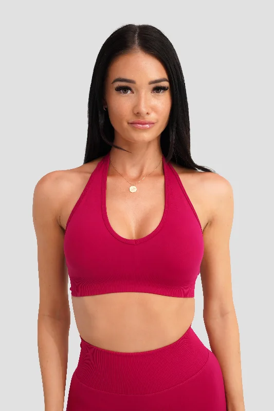 white women sport bra for a clean lookRECOIL HALTER CROP - CRANBERRY